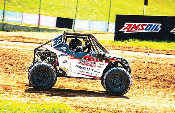 Gaborik Geyen pictured in action in his custom fabricated side-by-side car.