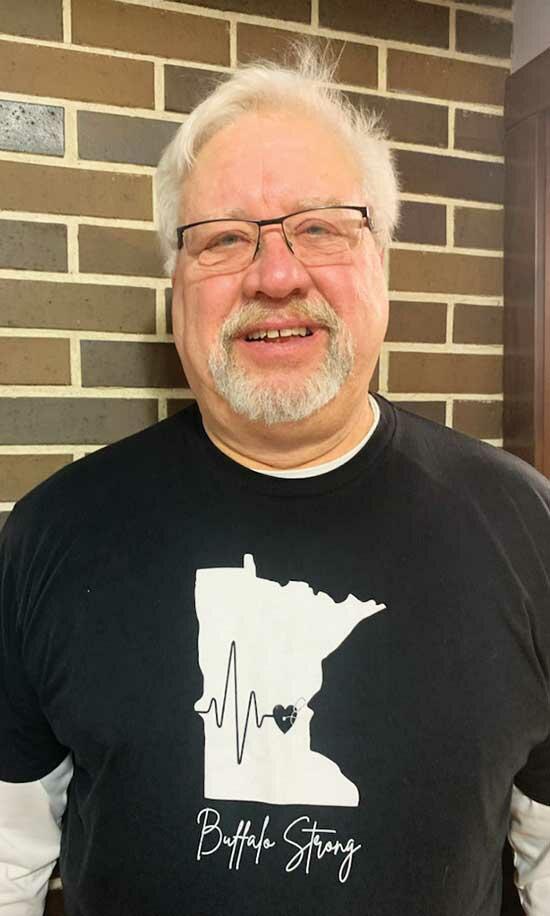 Randy Haskins, sporting a Buffalo Strong t-shirt, has worked on ensuring that Buffalo Strong will carry on for years to come, by offering education and resources for mental health. He is hopeful for continued healing throughout the community. (Photo submitted by Randy Haskins)