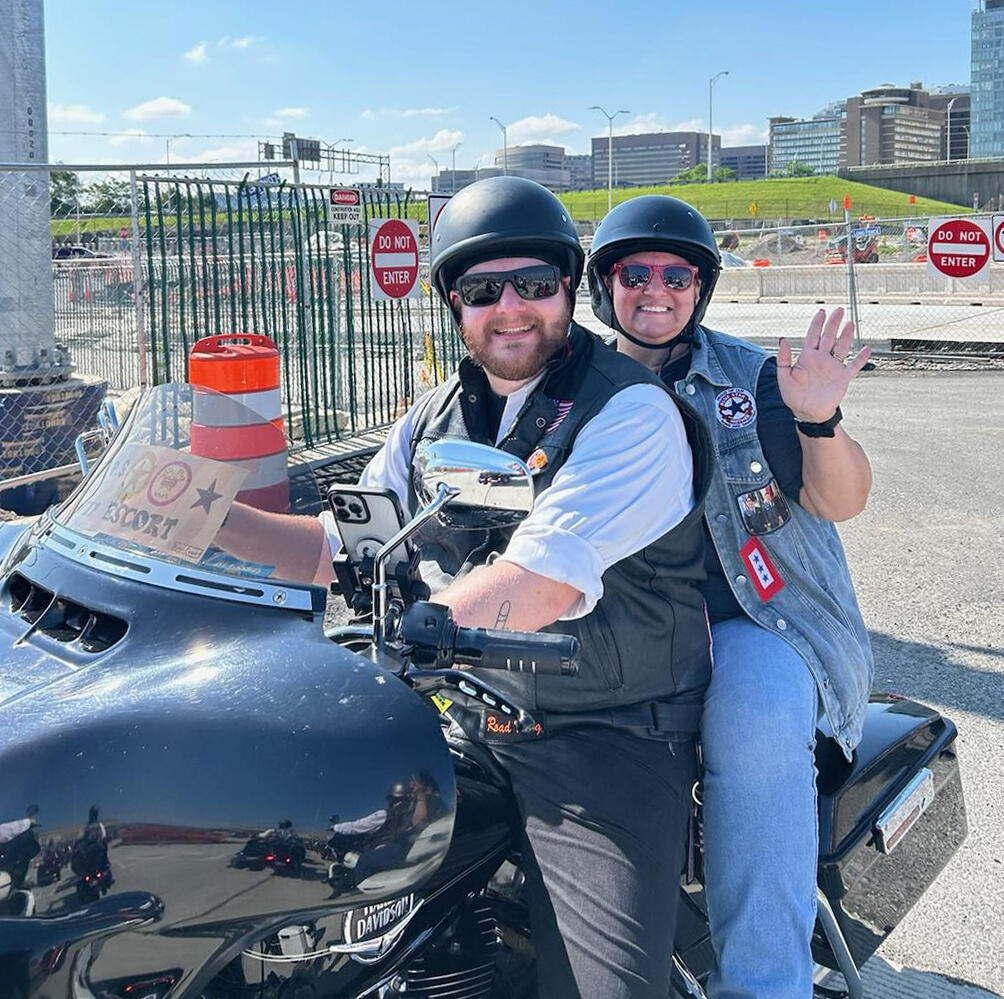Volunteer escort, JJ Hannon, from Pennsylvania, and rider Department of MN President Jen Pecarina, enter the Pentagon parking lot for the Rolling to Remember demonstration ride held in Washington, DC on Memorial Day weekend.