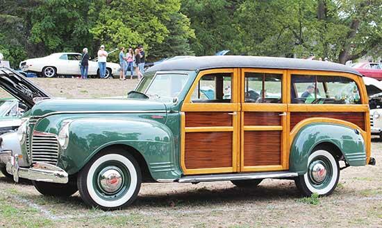 A 1941 Special Deluxe Woodie, owned by Tom Gagner, of Plymouth, stood out with its wooden accents and mossy green color. (Photo by Shelby Hulstein)