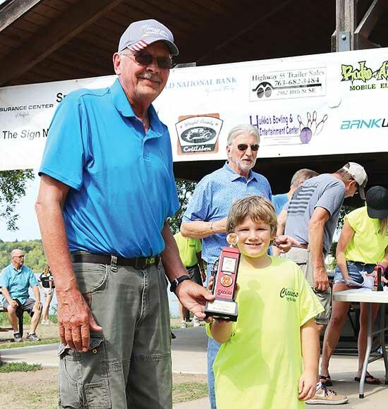Don Schwanke, of Buffalo, left, won “Best in Show” for his 1967 Pontiac GTO. (Photo by Paul Lyon)