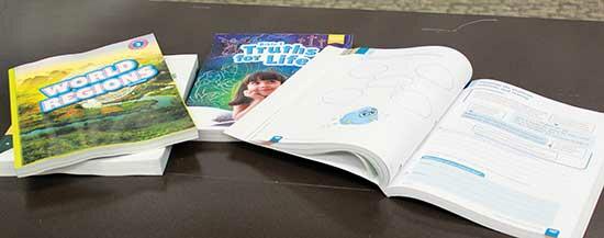 Textbooks for future students of the new Christian school coming to Buffalo. ICA plans to provide a faith-based curriculum for their students starting in the fall of 2022.